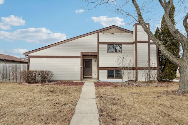 view of front of house with a front lawn