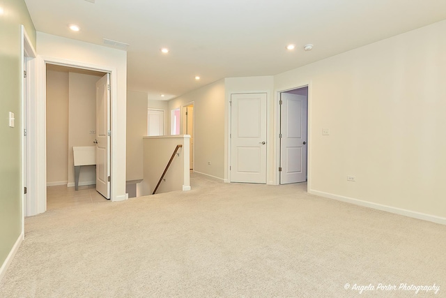 empty room with light carpet