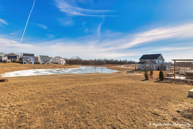 view of yard with a water view