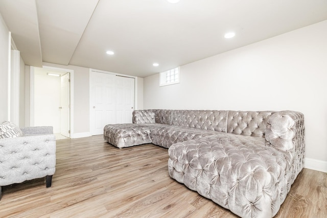 living room with light hardwood / wood-style flooring