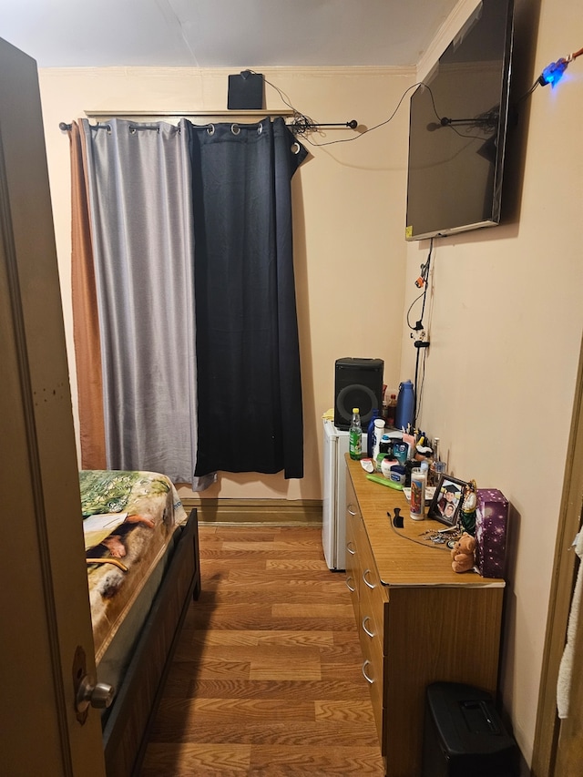 bedroom featuring dark hardwood / wood-style floors