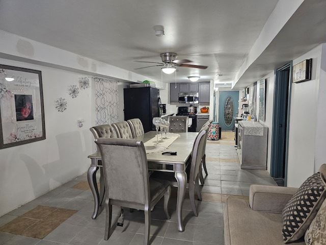 dining space featuring ceiling fan