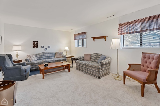 living room with light colored carpet