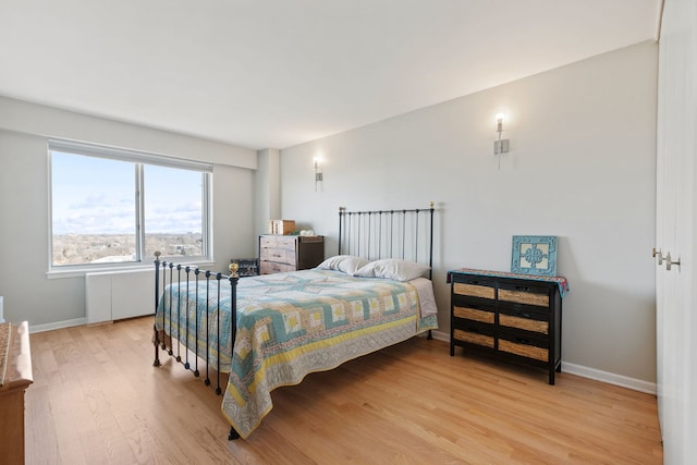 bedroom featuring hardwood / wood-style floors