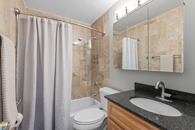 full bathroom featuring vanity, shower / bath combination with curtain, and toilet