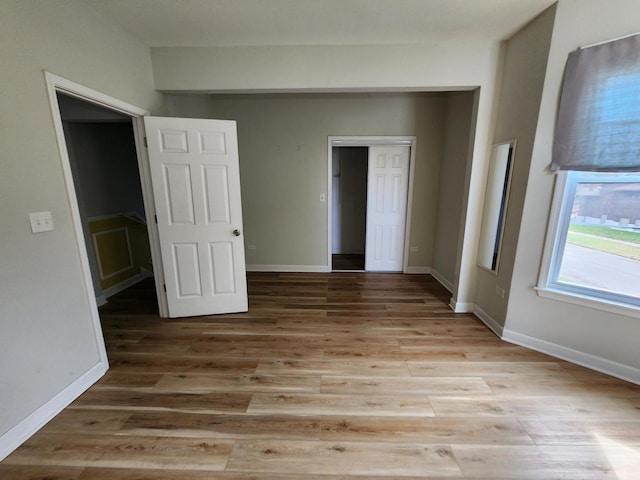 unfurnished bedroom featuring light hardwood / wood-style floors