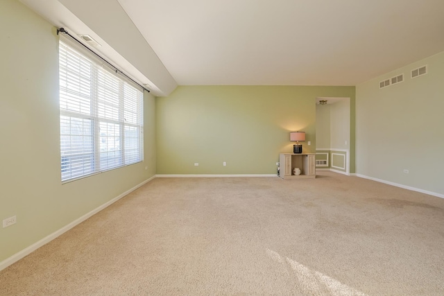 unfurnished room with carpet flooring