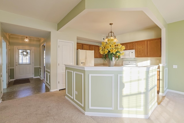 kitchen with decorative light fixtures, light colored carpet, a notable chandelier, beamed ceiling, and white appliances