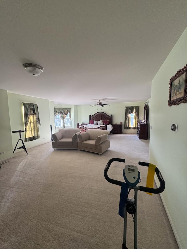 bedroom featuring light carpet