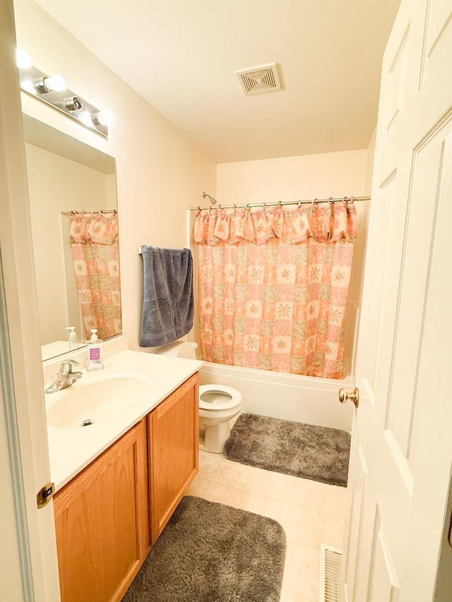 full bathroom with vanity, toilet, and shower / bath combo with shower curtain