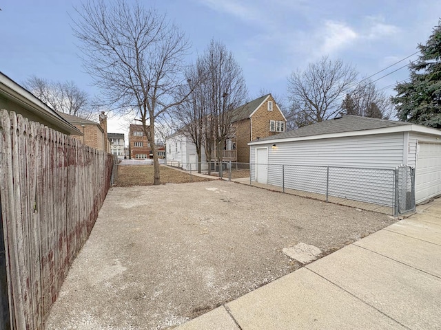 view of yard with a garage