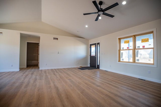 unfurnished living room featuring visible vents, a ceiling fan, recessed lighting, wood finished floors, and lofted ceiling