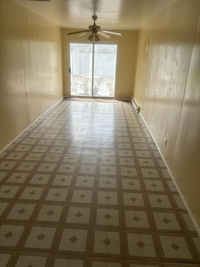 empty room featuring a baseboard radiator and ceiling fan