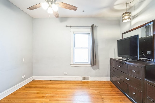 bedroom featuring ceiling fan and light wood-type flooring