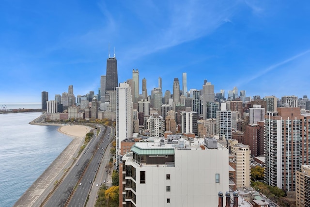 city view featuring a beach view and a water view