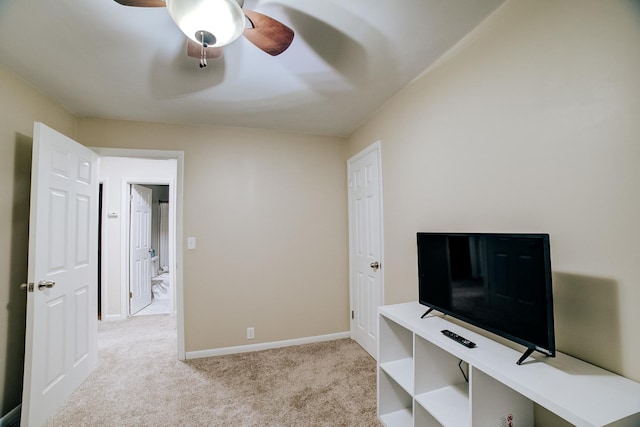 bedroom with light colored carpet and ceiling fan