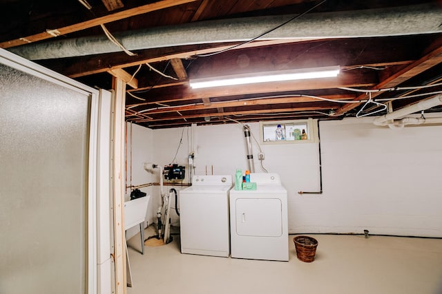 laundry room featuring separate washer and dryer