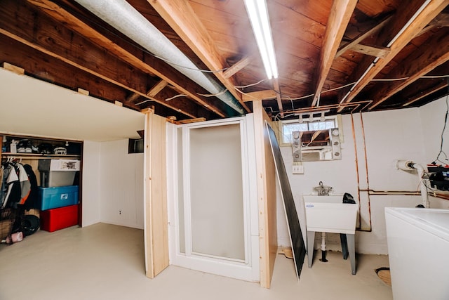 basement featuring washer / clothes dryer