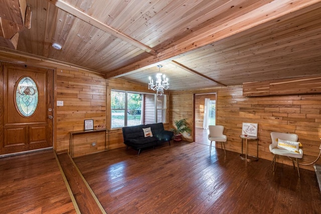 living area with wood ceiling, lofted ceiling with beams, and wood walls