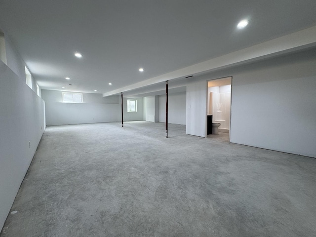 basement with carpet flooring and recessed lighting