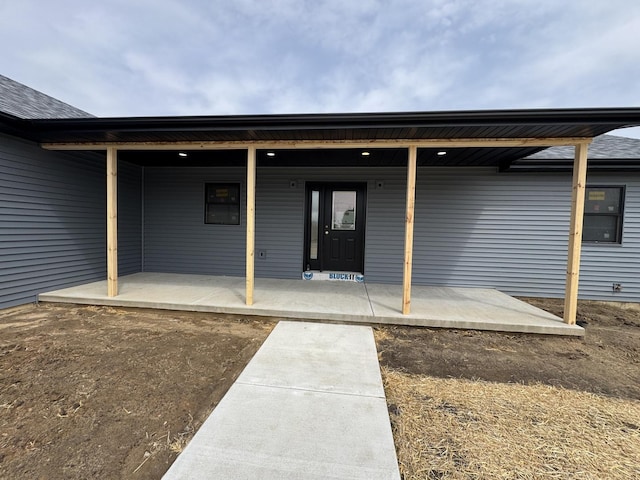 property entrance with a porch