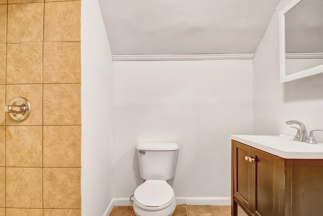 bathroom with vanity, toilet, and tile patterned flooring