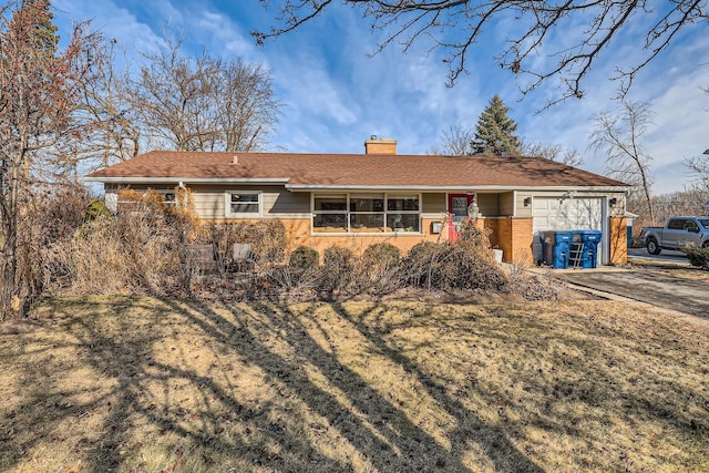 ranch-style house with a front lawn