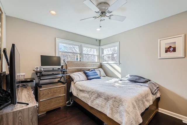 bedroom featuring dark hardwood / wood-style floors and ceiling fan