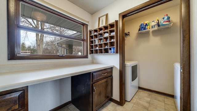 clothes washing area featuring washer / clothes dryer