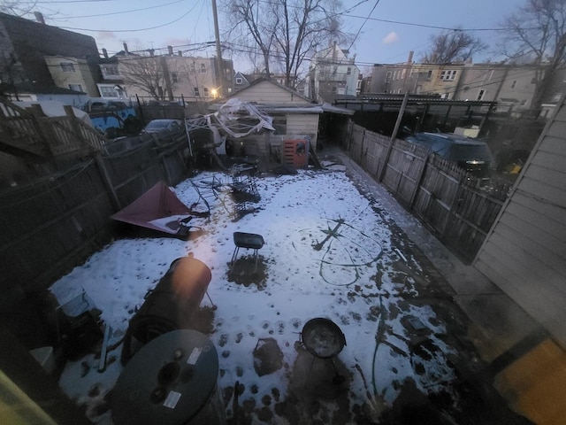 view of yard covered in snow