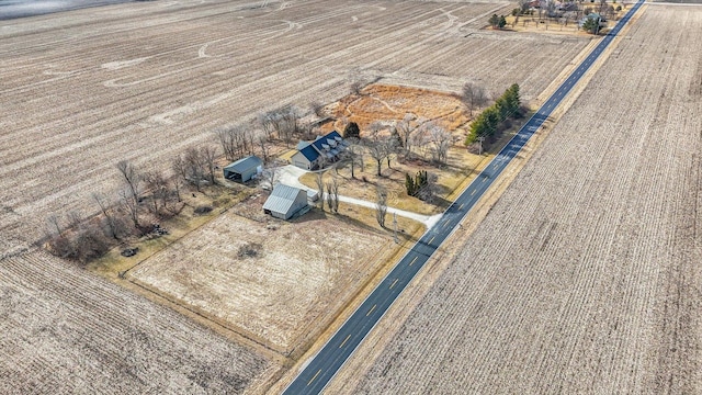 birds eye view of property featuring a rural view