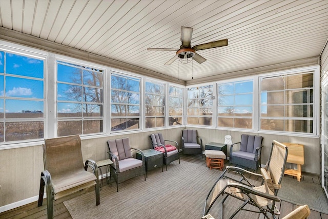 sunroom with a ceiling fan