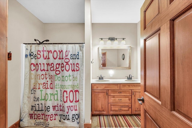 full bathroom with double vanity, a sink, and a shower with shower curtain