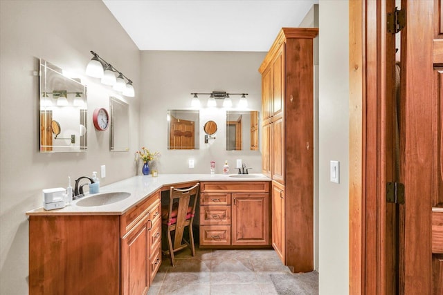 full bathroom with vanity and tile patterned floors