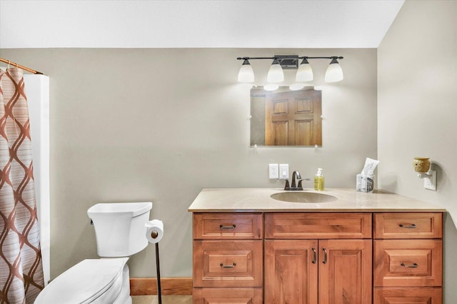 full bathroom with vanity, toilet, and a shower with curtain