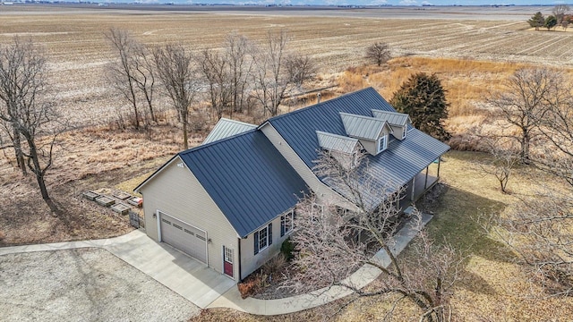 birds eye view of property featuring a rural view