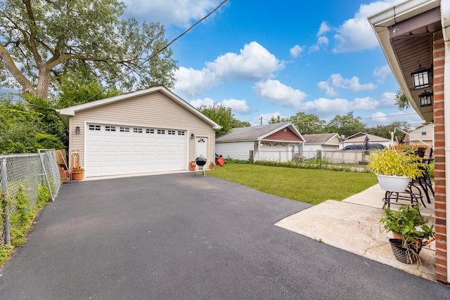 garage with a lawn