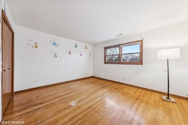 empty room featuring light hardwood / wood-style floors