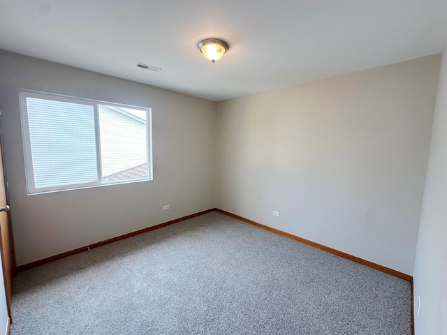 spare room with carpet flooring