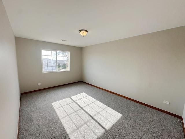 empty room featuring carpet