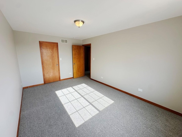 unfurnished bedroom with carpet flooring