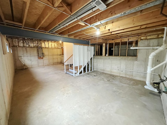 basement with electric panel