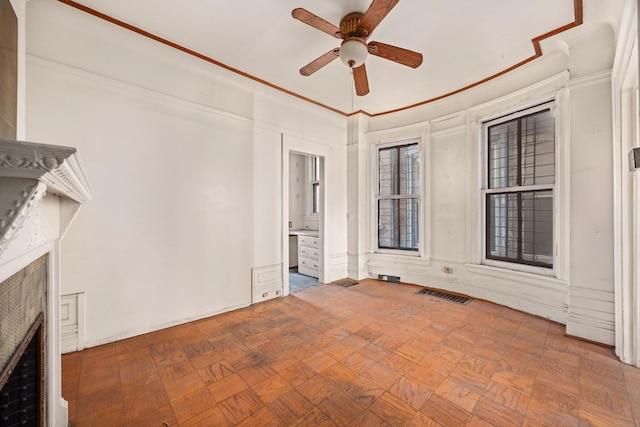 interior space featuring parquet floors and ceiling fan