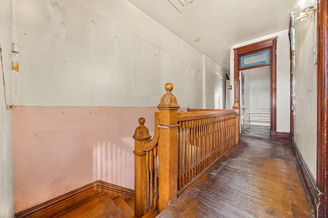 hall with dark wood-type flooring