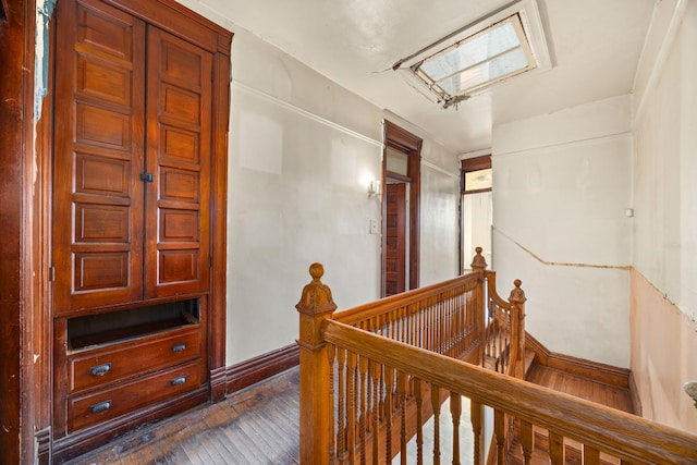 hall with dark hardwood / wood-style floors