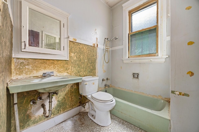 full bathroom with shower / tub combination, sink, toilet, crown molding, and tile patterned floors