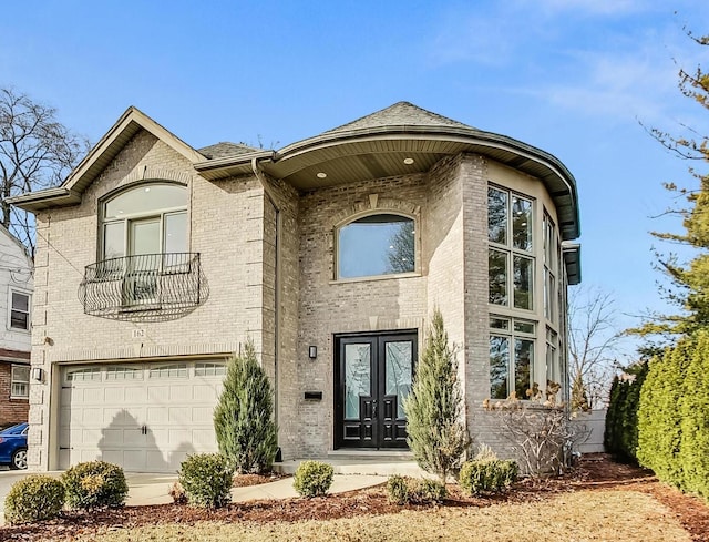 view of front of house featuring french doors and a garage