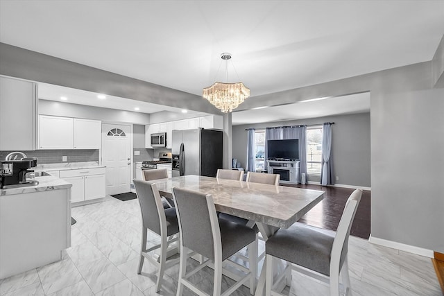 dining room featuring an inviting chandelier