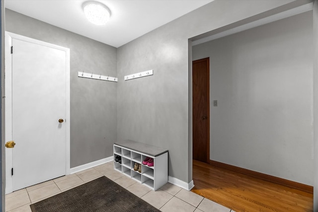 foyer entrance with light tile patterned flooring