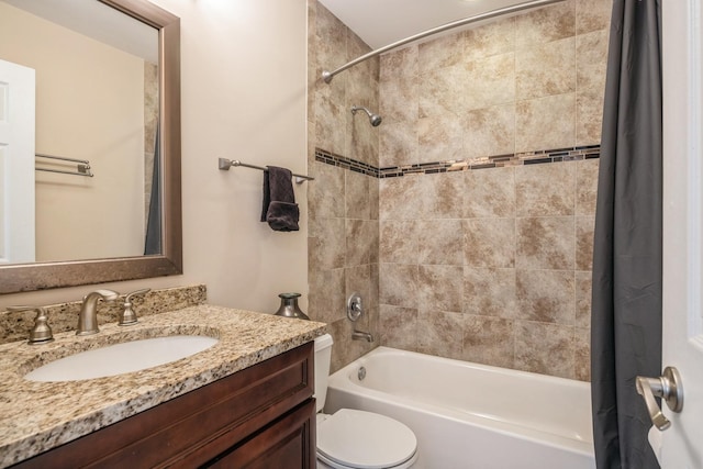 full bathroom featuring toilet, vanity, and shower / bathtub combination with curtain